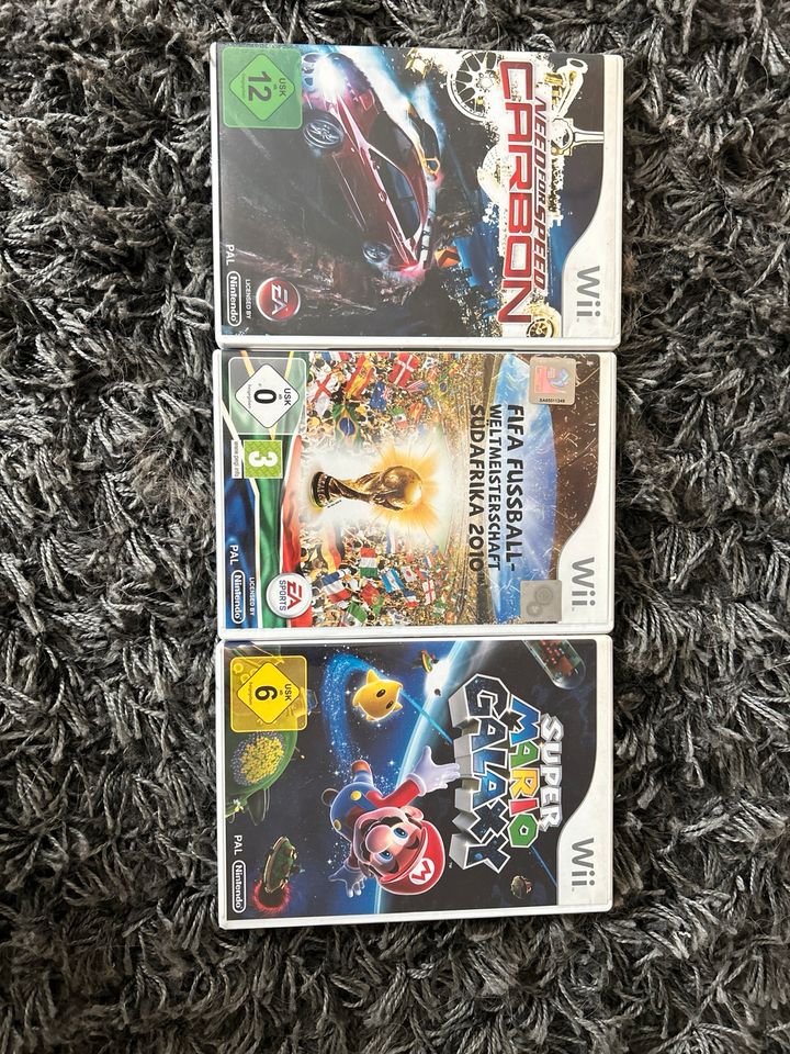 Super Mario Galaxy + Need for Speed Carbon + FIFA WM 2010 in Moers