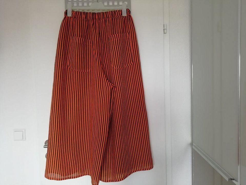 Leinenhose orange/schwarz ca. Gr. 42 bzw. 3, neuwertig. in Renningen