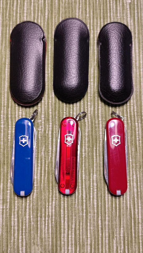 3 x Victorinox Schweizer Taschenmesser blau, rot, rot transparent in Bergisch Gladbach