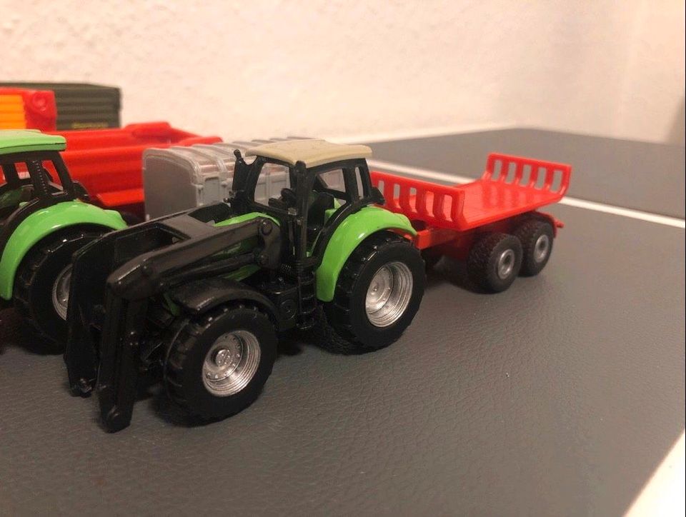 Siku Landtechnik-Konvolut (Deutz, Claas, John Deere,…) 1:87 in Celle