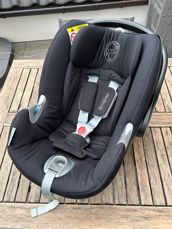 Babyschale Cybex Aton Q + Isofix-Base + Buggy + Winterfußsack in Glandorf