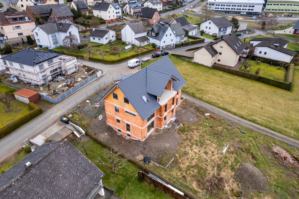 Wohnen und Investieren: Vielseitiges Mehrfamilienhaus in Bischoffen / Option: Schlüsselfertig kaufen in Bischoffen
