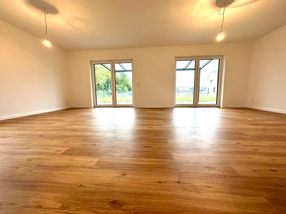 Haus zur Miete 155m² Neubau 5,5 Zimmer KfW55 Wärmepumpe mit 2 Bäder Carport Garten Nienburg Haßbergen in Haßbergen