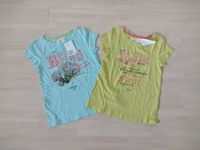 H&M: 2 T-Shirts mit Druck, Größe 122/128, Neu mit Etikett Nordrhein-Westfalen - Haan Vorschau