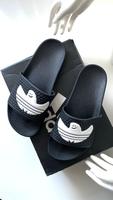 Adidas Originals X Shmoofoil Slides in schwarz weiß / Gr. 7 / 40 Nordrhein-Westfalen - Bad Oeynhausen Vorschau