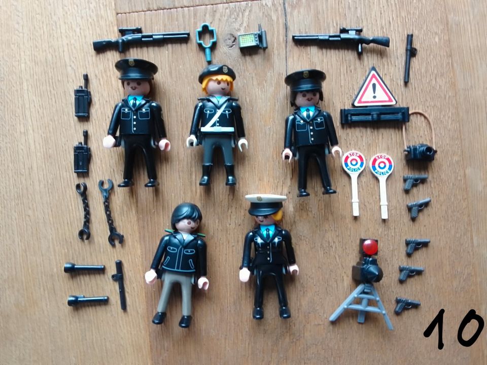 Verkaufe viele Playmobil Sets Polizei SEK Figuren Auto Bus Boot in Fehmarn