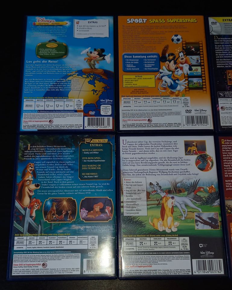 8 Walt Disney DVD Filme - Cap und Capper, Robin Hood, Micky Maus in Bocholt