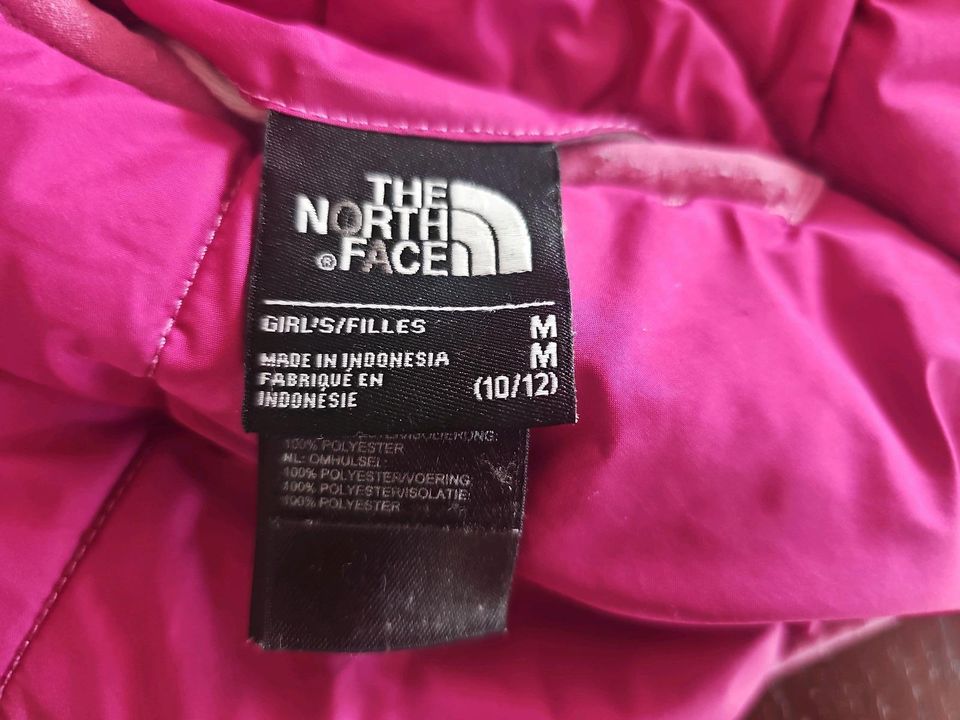 Wattierte pinke Wendejacke von The North Face in Gr. 140/146 in Berlin