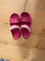Crocs Sandale on Pink C10 Größe 27/28 Nordrhein-Westfalen - Pulheim Vorschau