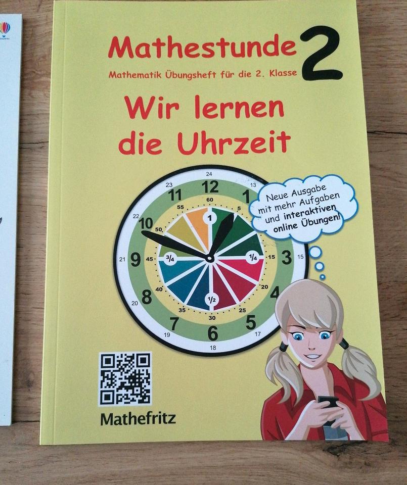 Uhr lernen - abwischbares Heft mit Stift + Arbeitsheft 2. Klasse in Kippenheim