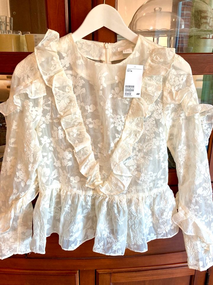 H&M Rüschenbluse creme Gr. 34 XS Neu mit Etikett in Meerbusch