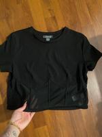 Schwarzes T-Shirt mit Korsagen-Effekt Niedersachsen - Emden Vorschau