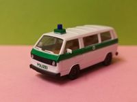 Herpa 4033 VW Bus T3 weiß - grün Polizei Bayern (1979-92) 1:87 H0 Hessen - Bad Wildungen Vorschau