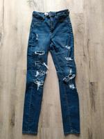 Tolle H&M Jeans Skinny destroyed mit Cut-Outs / Löcher, Größe 36 Bayern - Ichenhausen Vorschau