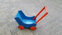 Puppen Wagen Puppe Kind Kinder Spielzeug Holz Blau rot Top Zustan Nordrhein-Westfalen - Barntrup Vorschau