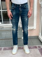 Dunkelblaue Jeans von Dsquared2 mit Destroyed-Look (Gr. 44) Bayern - Kammerstein Vorschau