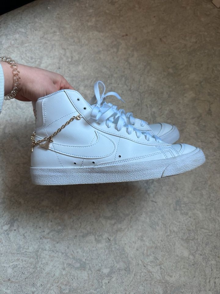 White nike with lucky charm in Hamburg