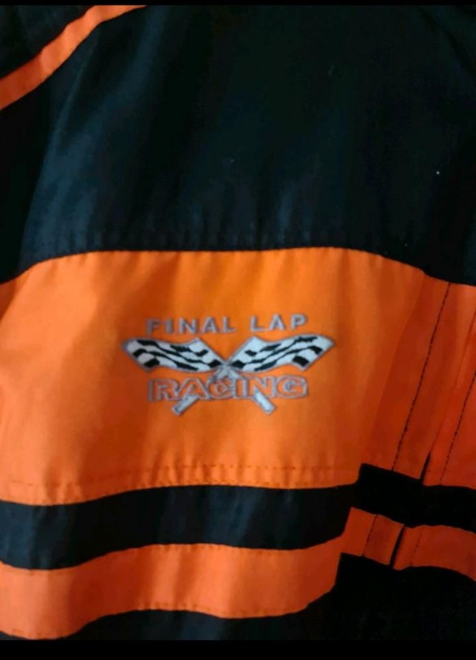 Motorrad Jacke schwarz/orange  gr. M inkl Protectoren in Wiefelstede