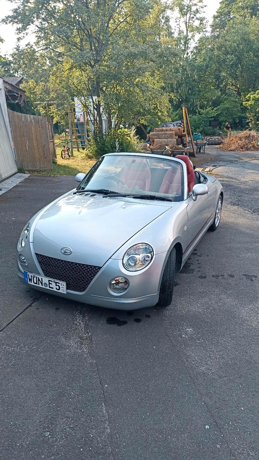 Abbildung des Autos Daihatsu Copen . Wenig K…