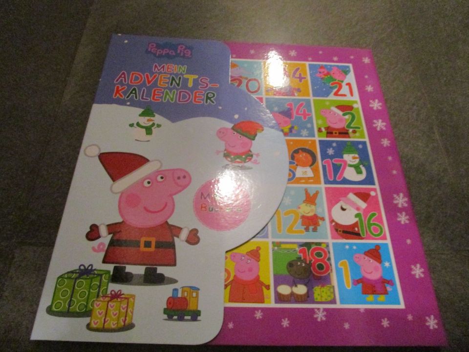 Adventskalender mit kleinen Büchern Peppa Pig Paw Patrol je in Retzstadt