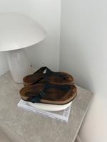 Birkenstock Gizeh Zehentrenner Sandalen schwarz Lack Gr. 39 Schleswig-Holstein - Puls Vorschau