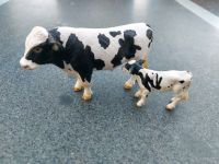 SCHLEICH Kalb 13634 + Bulle 13632  schwarz weiß Niedersachsen - Westoverledingen Vorschau