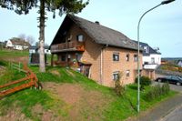 Ruhig gelegenes freistehendes 3-Familienhaus mit Balkon, Terrasse und Garage in Kerschenbach Rheinland-Pfalz - Kerschenbach Vorschau