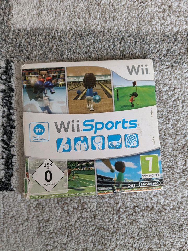 Nintendo Wii Spiele und Lenkrad in Wangen