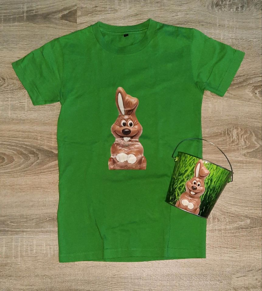 Shirt und Eimer mit Osterhasen aus Schokolade/ Schokohasen in Diekholzen