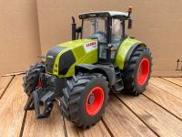 Funkferngesteuerter CLAAS Axion 850 Nordrhein-Westfalen - Harsewinkel Vorschau