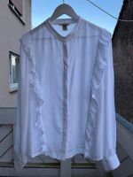 Weiße Bluse mit Rüschen von H&M in Größe 48 Hessen - Ronshausen Vorschau
