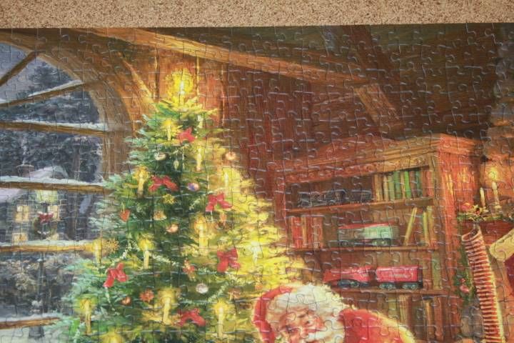 1000 Teile Puzzle Kinkade Der Weihnachtsmann ist da in Ellerau 