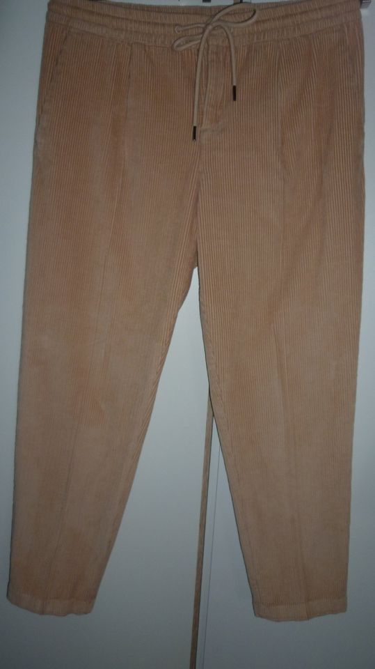 Cordhose mit flex. Bündchen Gr. 42 beige  C&A in Bad Rothenfelde