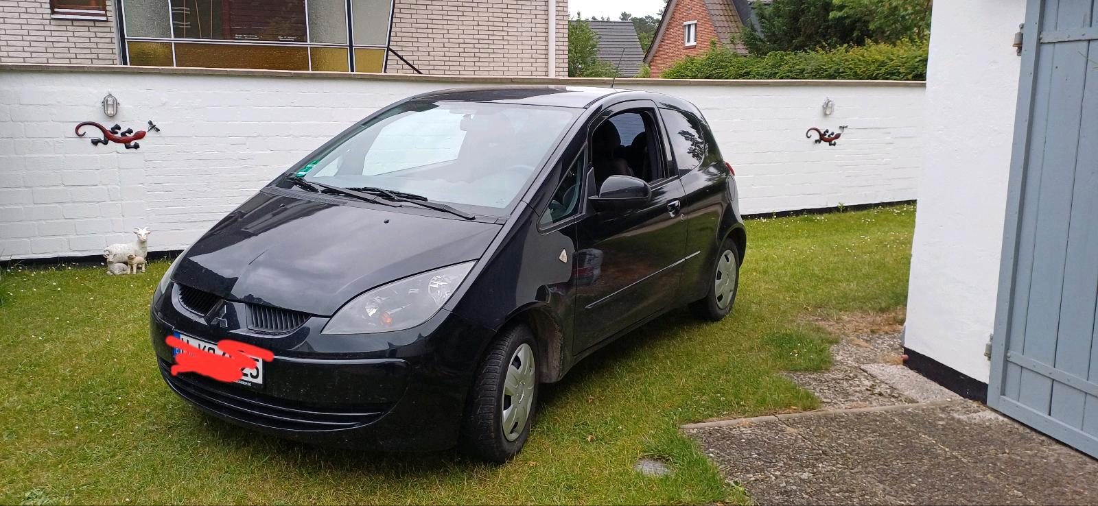 Abbildung des Autos Mitsubishi Colt wenig Ki…