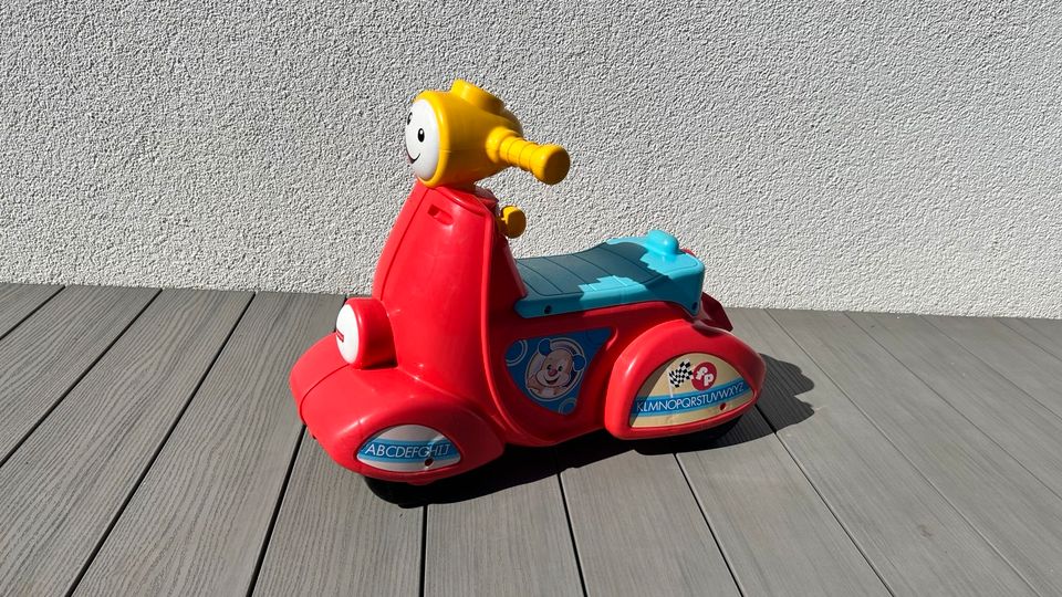 Fisher Price Lernspaßroller / Roller mit Musik in Niederkassel