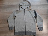 Graue Sweatjacke in Größe 134/140 von Yigga Kapuzenjacke Bad Doberan - Landkreis - Bartenshagen-Parkentin Vorschau