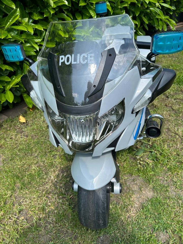 Polizei Motorrad Kindermotorrad Elektromotorrad in Rees