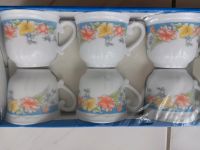 Neues Kaffeeservice 6-teilig 6 Tassen+Untertassen Weiß mit Blumen Nordrhein-Westfalen - Enger Vorschau