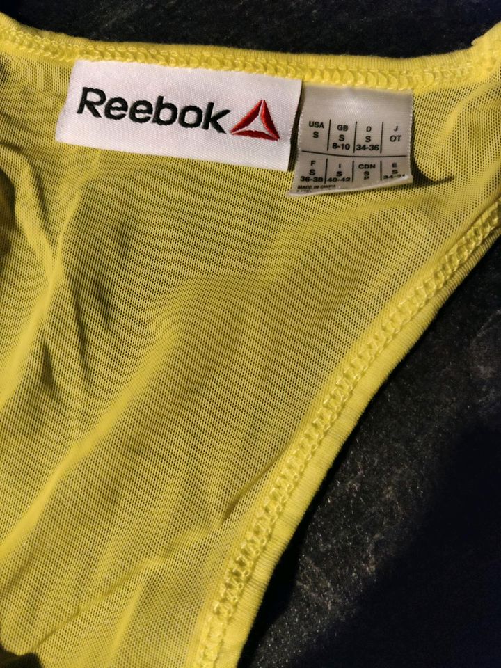 Reebok Sporttop gelb mit Print Gr. S in Bad Kreuznach