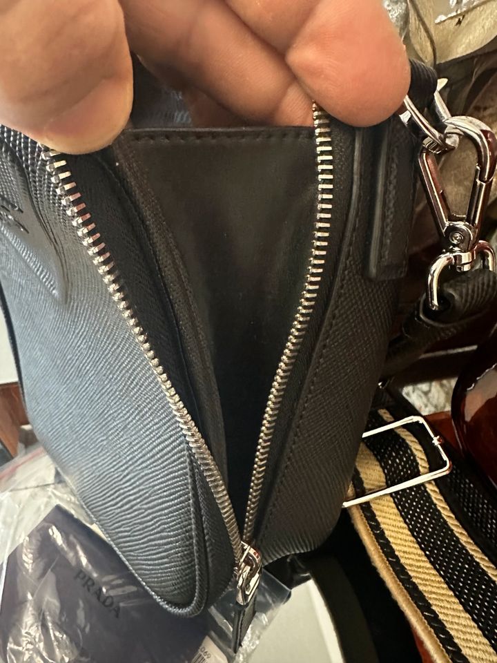 Prada Black Shoulder Bag With Embossed Logo in Berlin