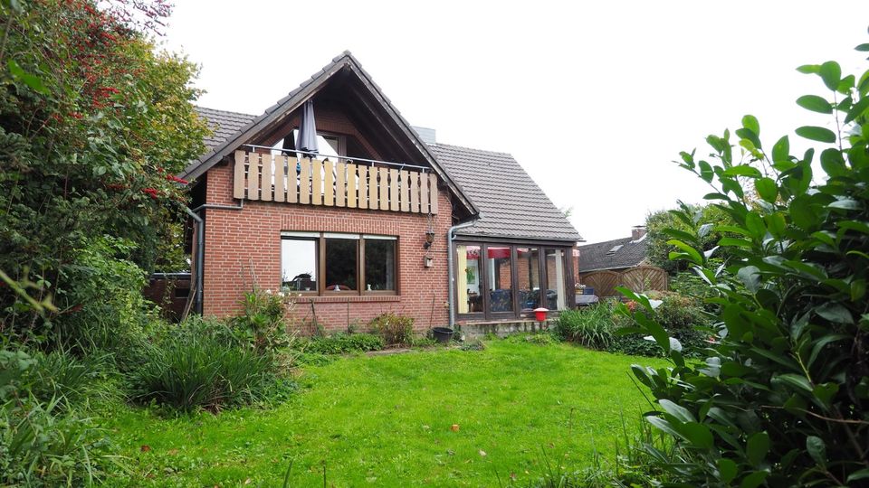 Doppeltes Wohnhaus mit Baugrundstück im beliebten Hasselt in Bedburg-Hau