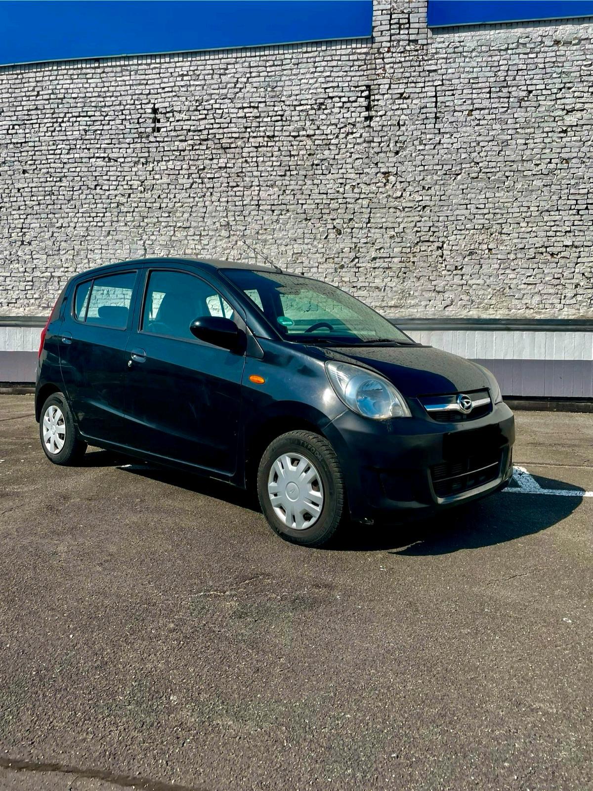 Abbildung des Autos dalhatsu cote Benzin  4 …