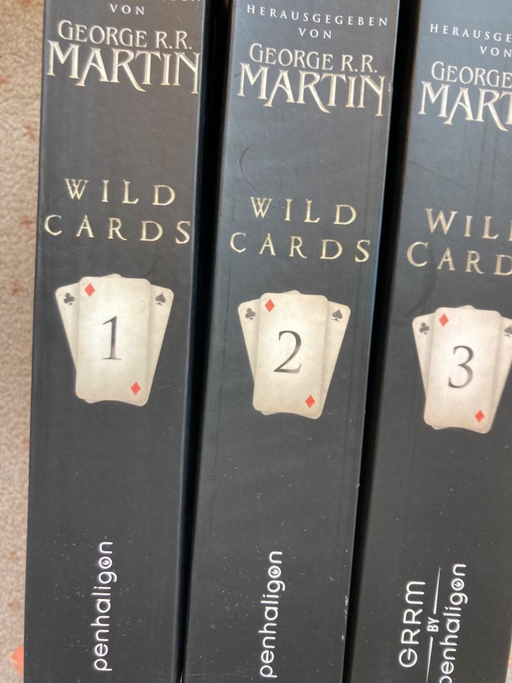 George R. R. Martin, Wild Cards, Trilogie in Düsseldorf