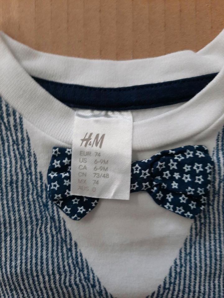 T-Shirt Gr. 74 von H&M mit Aufdruck in Ostelsheim