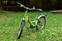 Puky Kinder-Fahrrad 18 Zoll (grün), Uvex Helm, Ersatzschlauch Leipzig - Schleußig Vorschau
