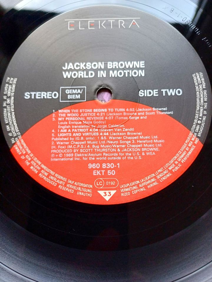 JACKSON BROWNE: "World in Motion" (LP/Vinyl,1989) NM/NM in Centrum
