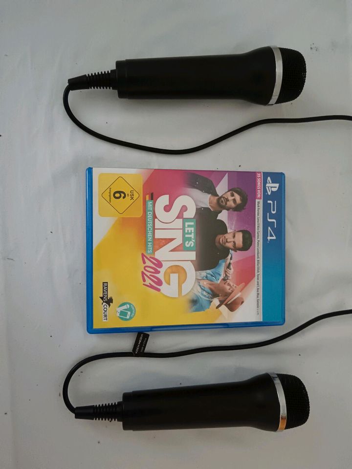 PS4 slim 500 GB + 4 Spiele inkl. SING mit 2 Mikrofonen in Mittenwalde