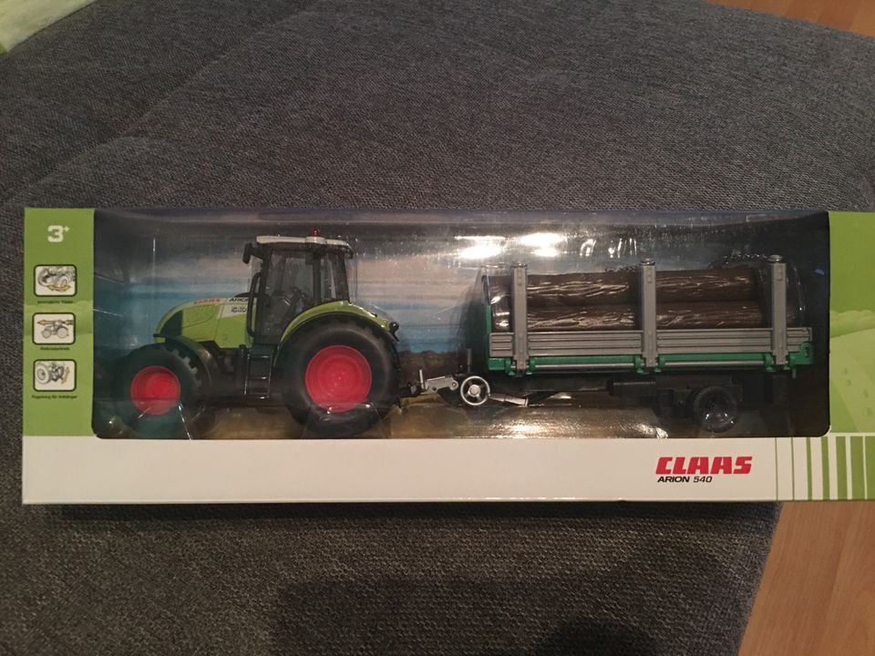 Herpa,Claas Arion 540 mit Holzanhänger,Traktor,Spielzeug in Hohenwart