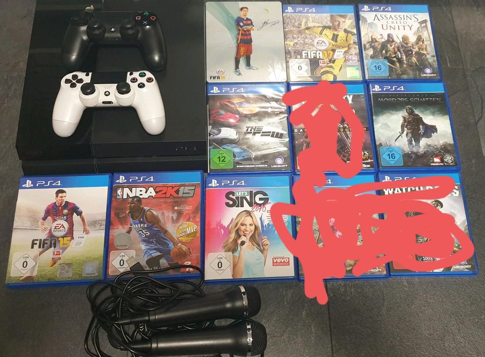 Playstation 4 mit zwei Controllern, Mikrofonen und Spielen in Nohfelden