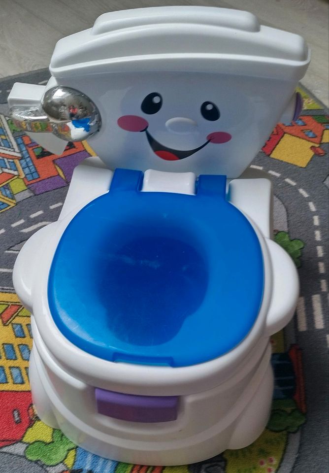 Wir bieten eine Fisher - Price P4326 Meine erste Toilette an in Struxdorf